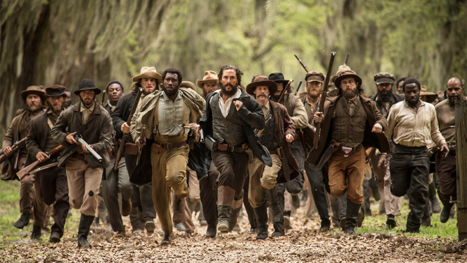 Matthew McConaughey (center) and Mahershala Ali (center left) star in THE FREE STATE OF JONES